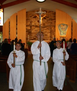 Submitted St. Helen School recently celebrated its first school Mass with eighth-graders (l to r) Bradford Fram, Andrew Kampe and Katie Lee as the servers.