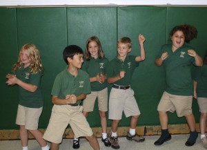 Submitted St. Helen School third-graders (l to r) Lucy Joyce, Ean Bartholomew, Isabella Adair, Jack Murray and Allison Blasko dance for joy for the start of the school’s magazine drive.