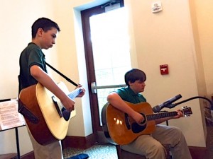 Submitted St. Helen seventh-graders Garrett Sah and William Steigerwald lead students in a special Mother’s Day Guitar Mass.